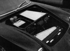 The underbonnet luggage space has been given up to the complex air conditioning system demanded by Japanese customers.
